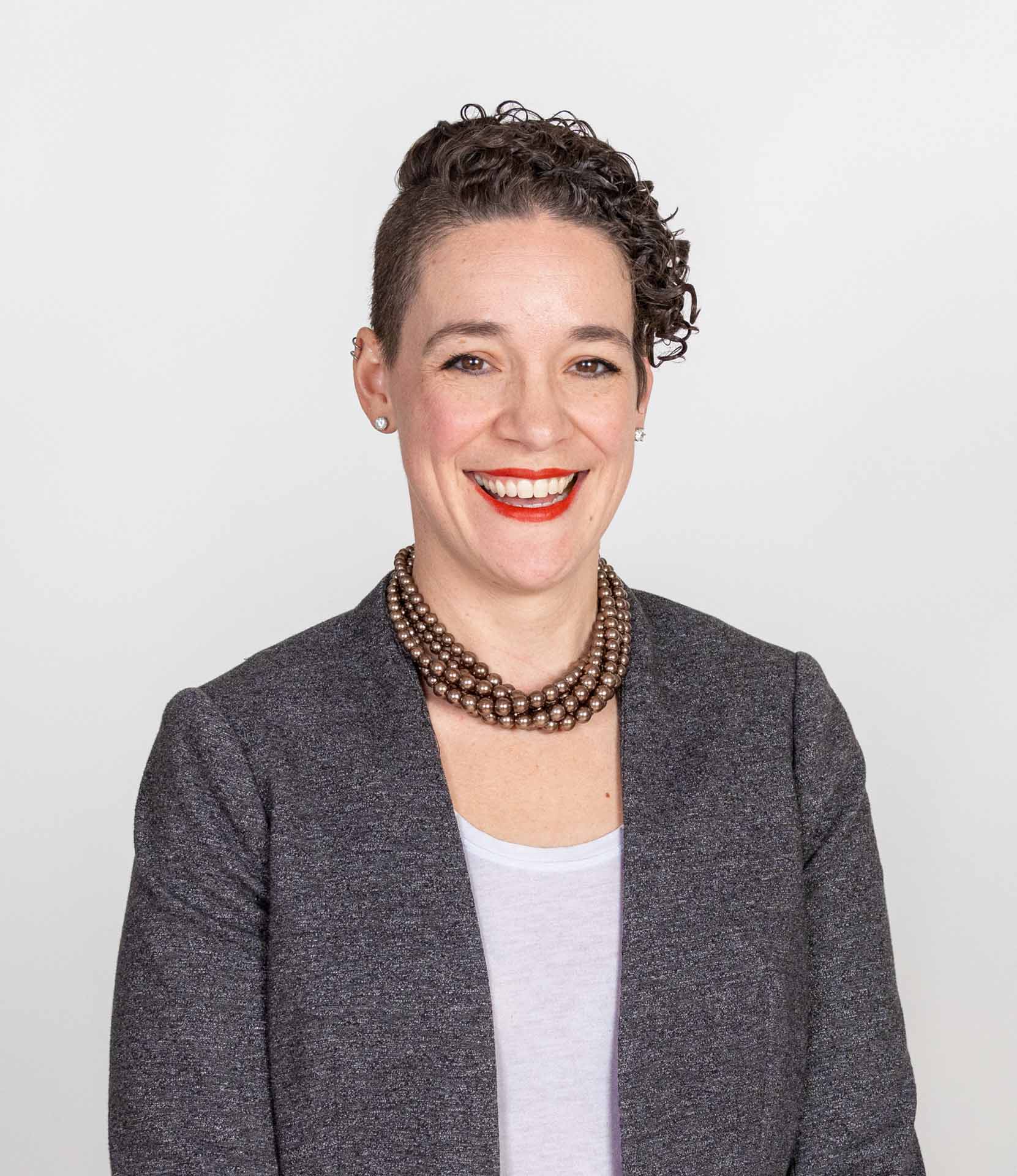 Headshot of photographer Allison Malone Bright, colorful professional headshot picture of Twin Cities photographer Alison Malone