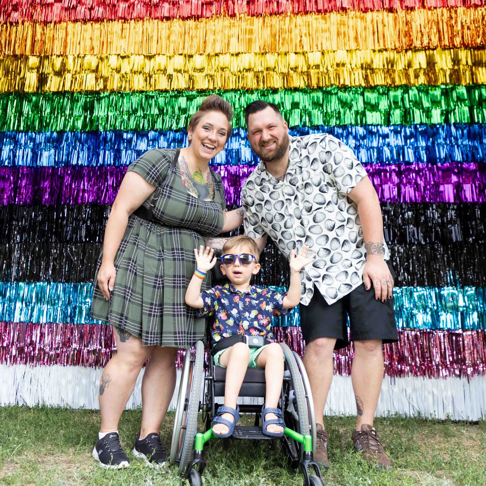 LGBTQ+ family with disabled child in wheelchair at Target's Pride Event in Minneapolis
