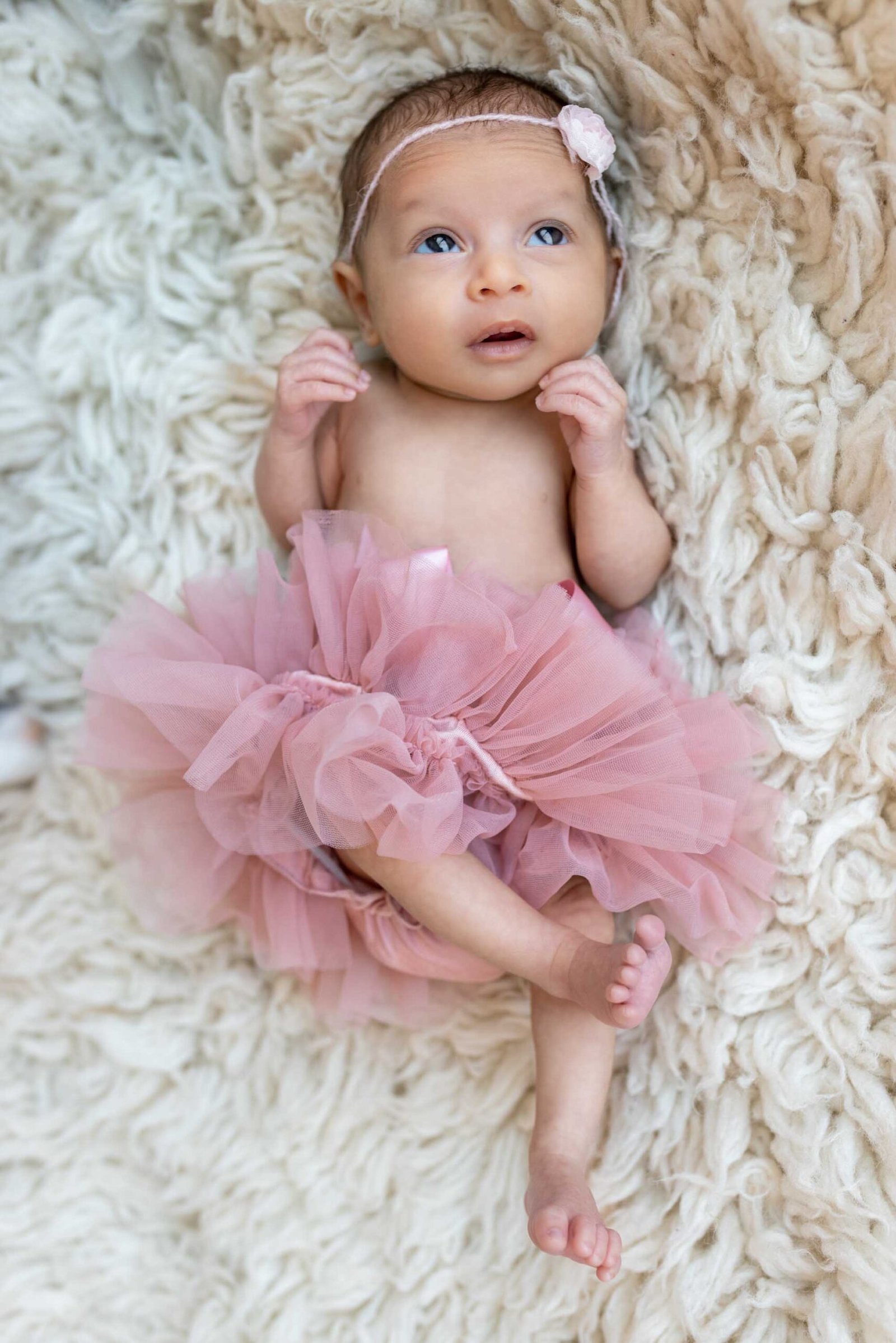 photo of gorgeous baby girl from a newborn photo session for loving Minneapolis family